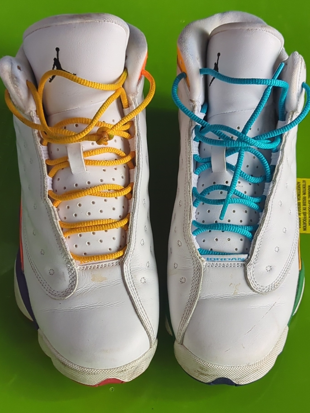Jordan Kids White Sneakers with Yellow and Teal Laces